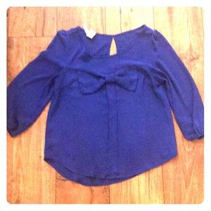 Blue shirt with bow detail